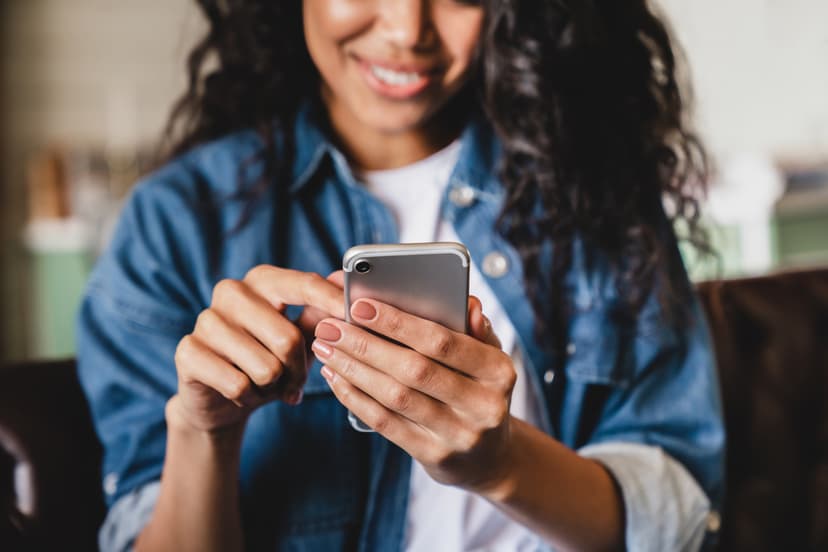 Person engaging with their phone device