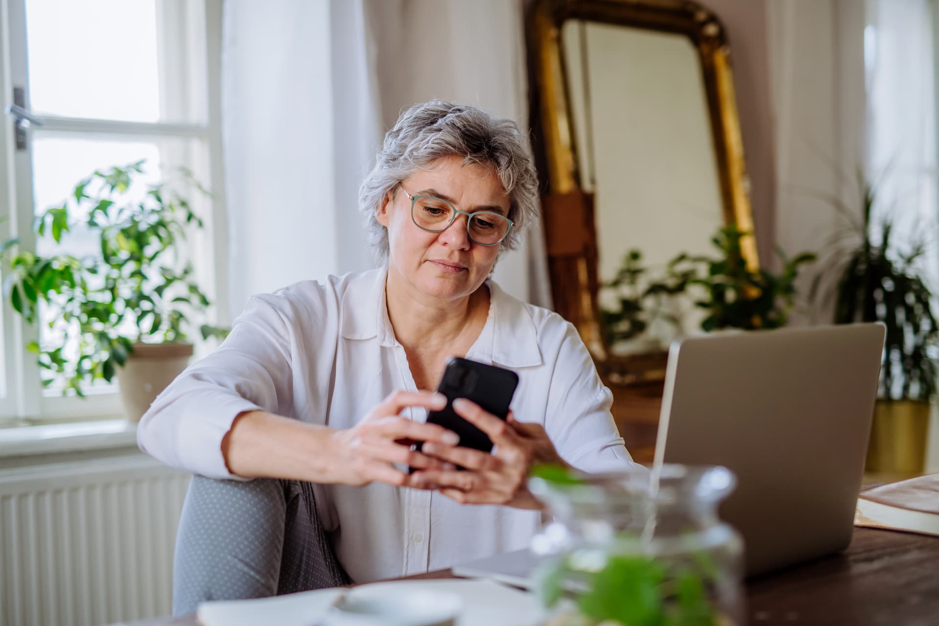 Woman looking at smart phone