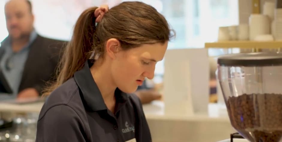 Paige working at coffee machine