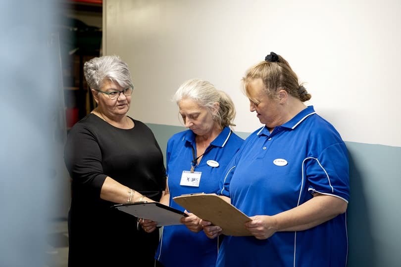 Christine_talking_with_others