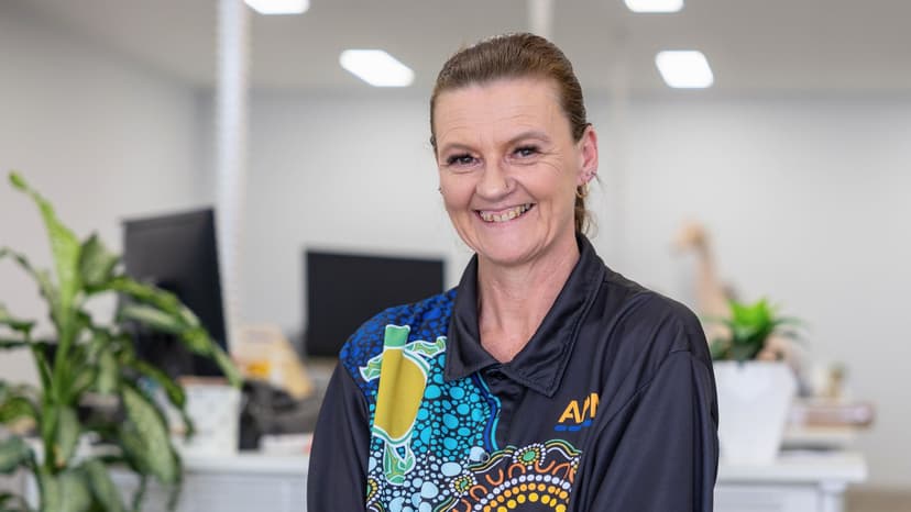 Rochelle from APM in a First Nations top
