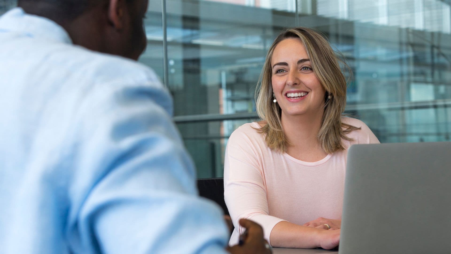 A woman smiles during an interview
