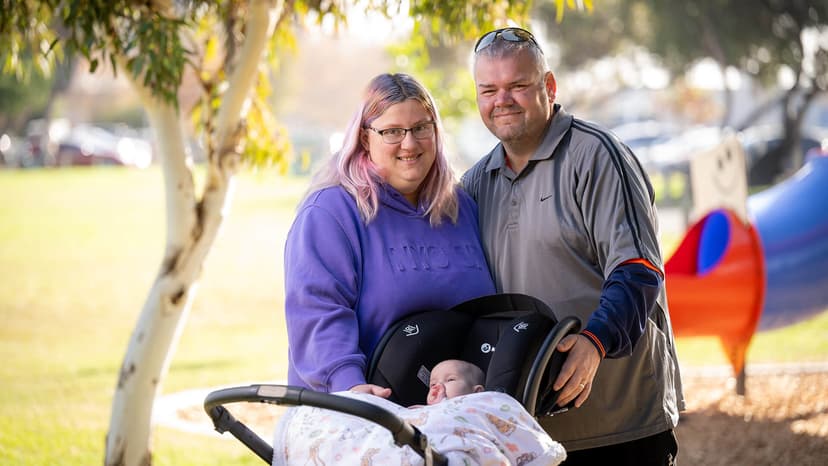 Inclusive employment participant Geoff with his partner and baby