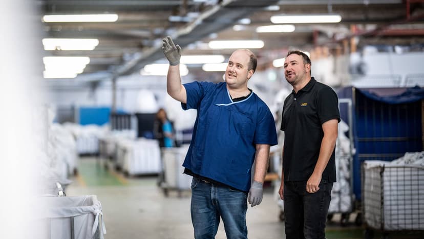 DES participant Stephen with an APM consultant in a warehouse