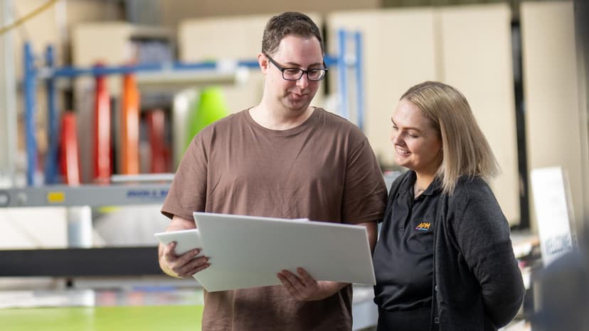 DES participant Sean shows APM EC Amelia some of his latest work.