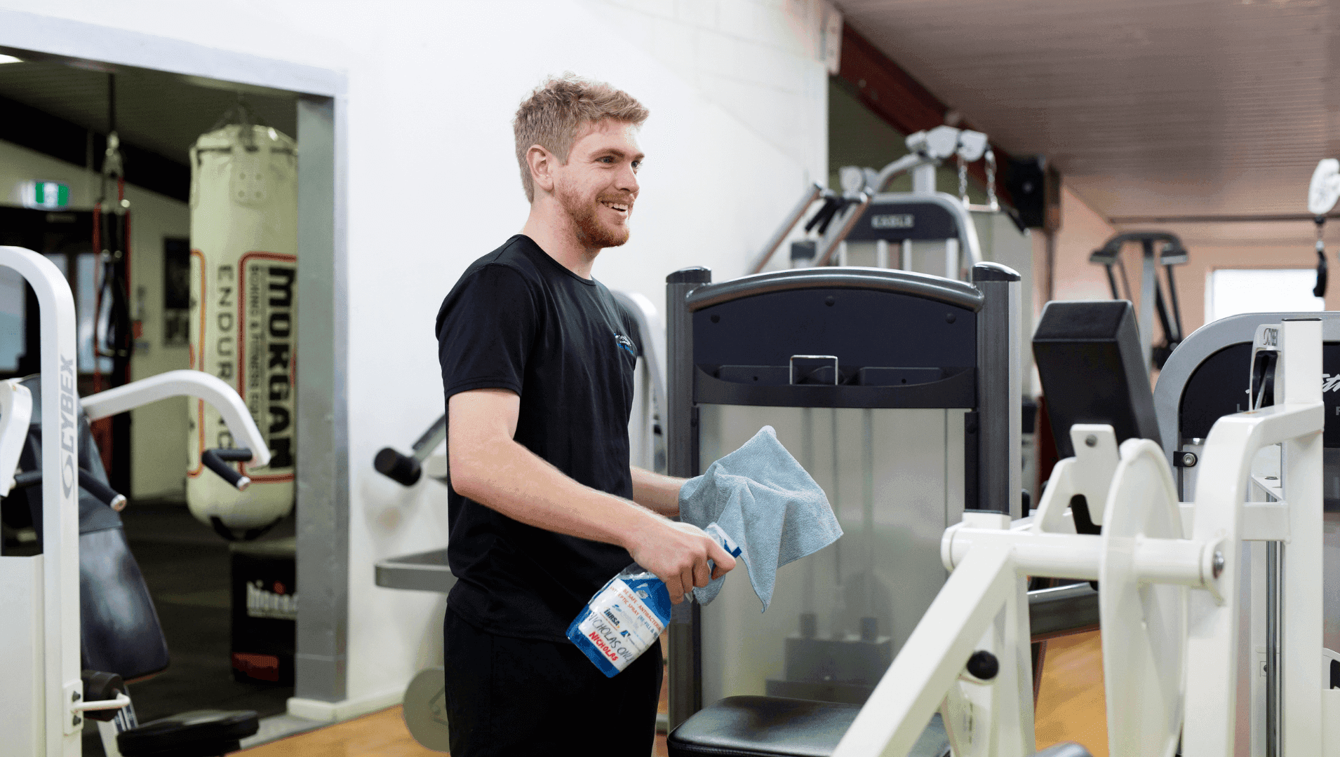 DES participant Nicholas working in a gym