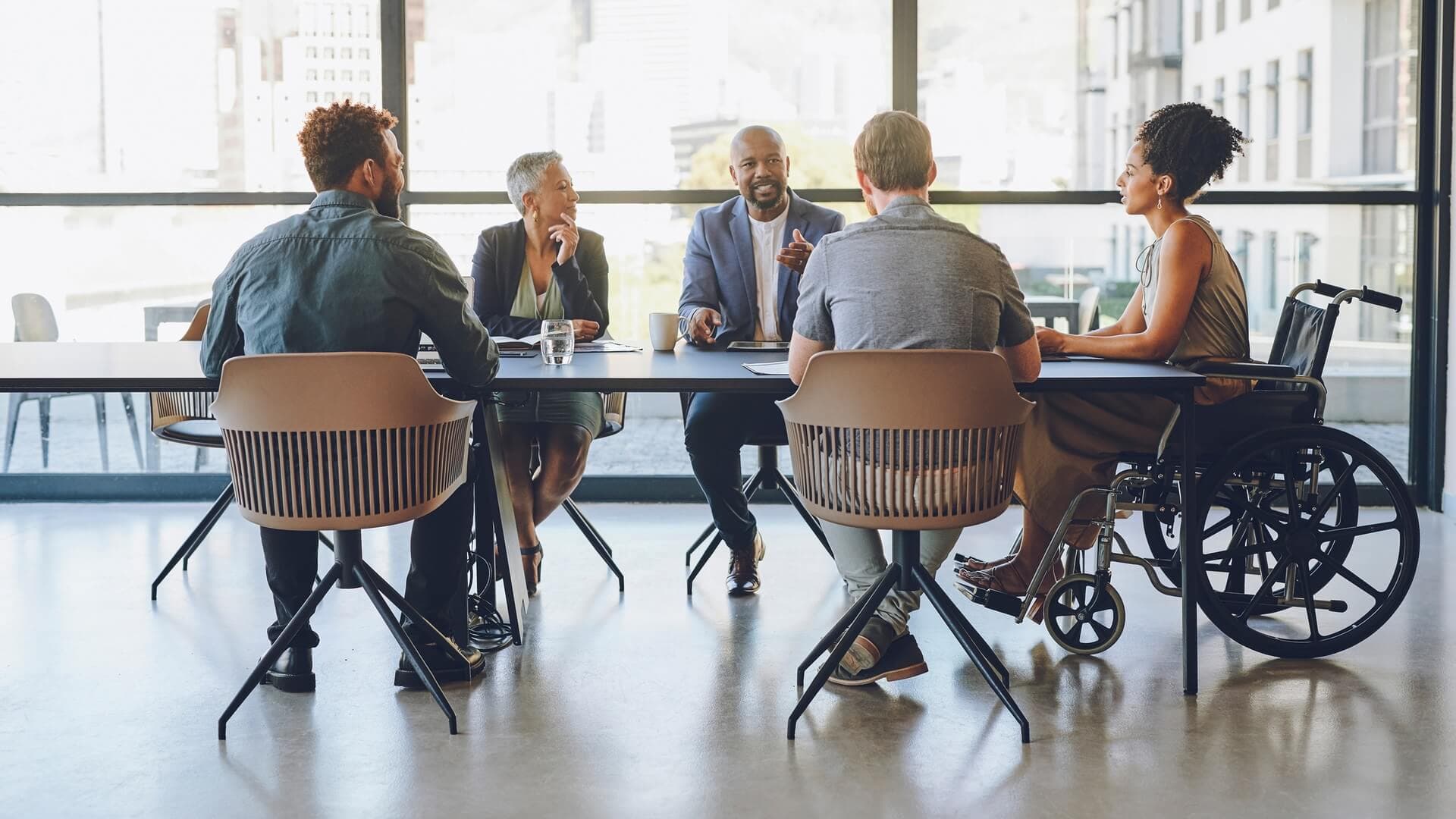 A diverse team of employees in a meeting