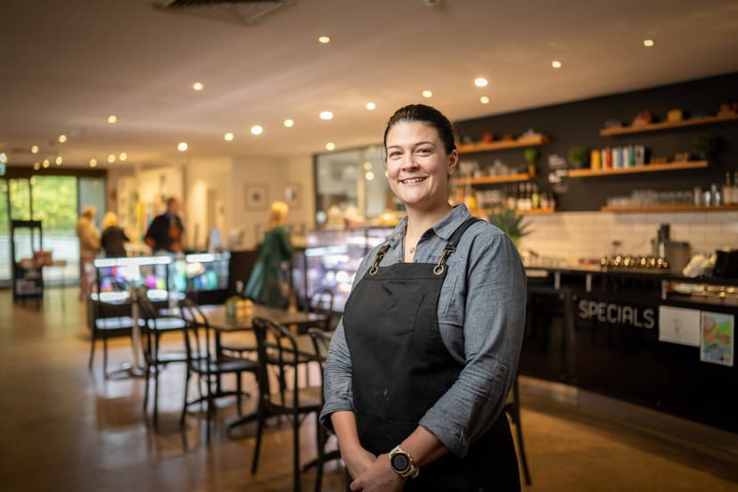 Cafe owner KAthryn in an apron